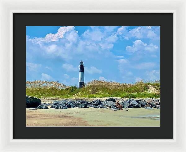 Lighthouse by a Tranquil Shoreline - Framed Print