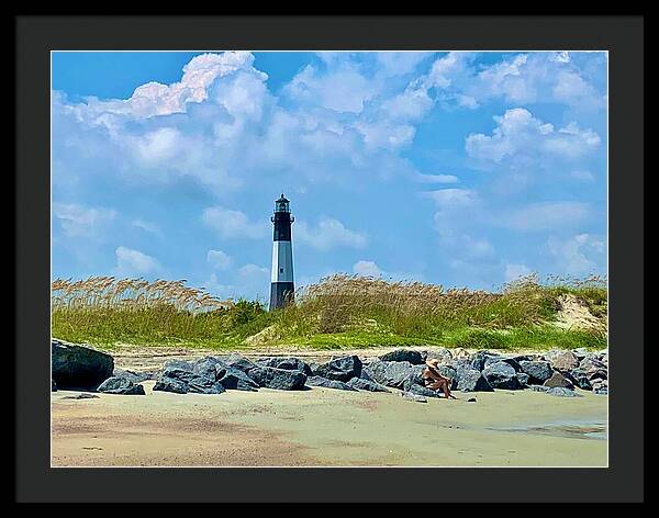 Lighthouse by a Tranquil Shoreline - Framed Print