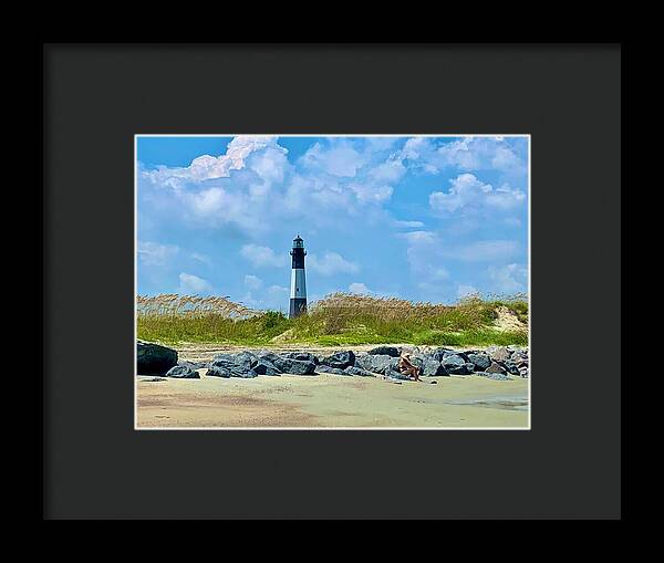 Lighthouse by a Tranquil Shoreline - Framed Print