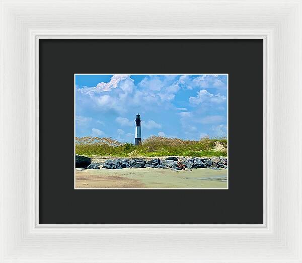 Lighthouse by a Tranquil Shoreline - Framed Print